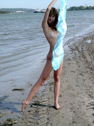 At the nudist beach teen girls play around naked #72253589