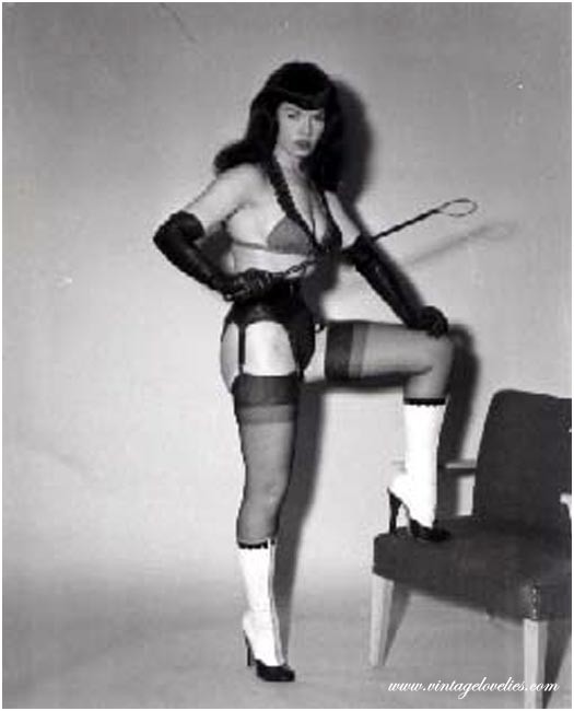 Pin-up star Bettie Page showing her sexy vintage stockings #76521505