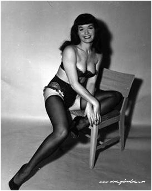 Pin-up star Bettie Page showing her sexy vintage stockings #76521511