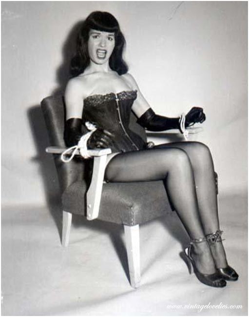 Pin-up star Bettie Page showing her sexy vintage stockings #76521544