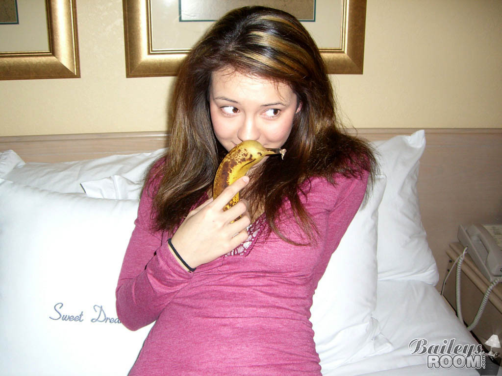 Teen in panties gets naughty with a big fat banana #78677235