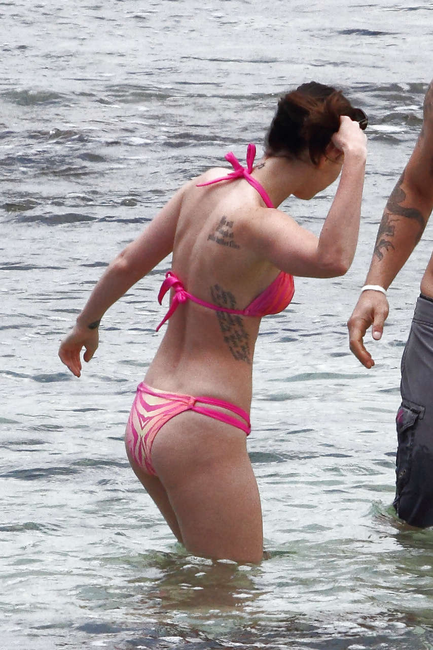 Megan Fox exposing her great body in bikini and sexy legs in mini skirt #75255242