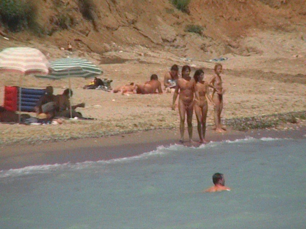 Her attractive physique receives a tan just after she strips naked #72252042