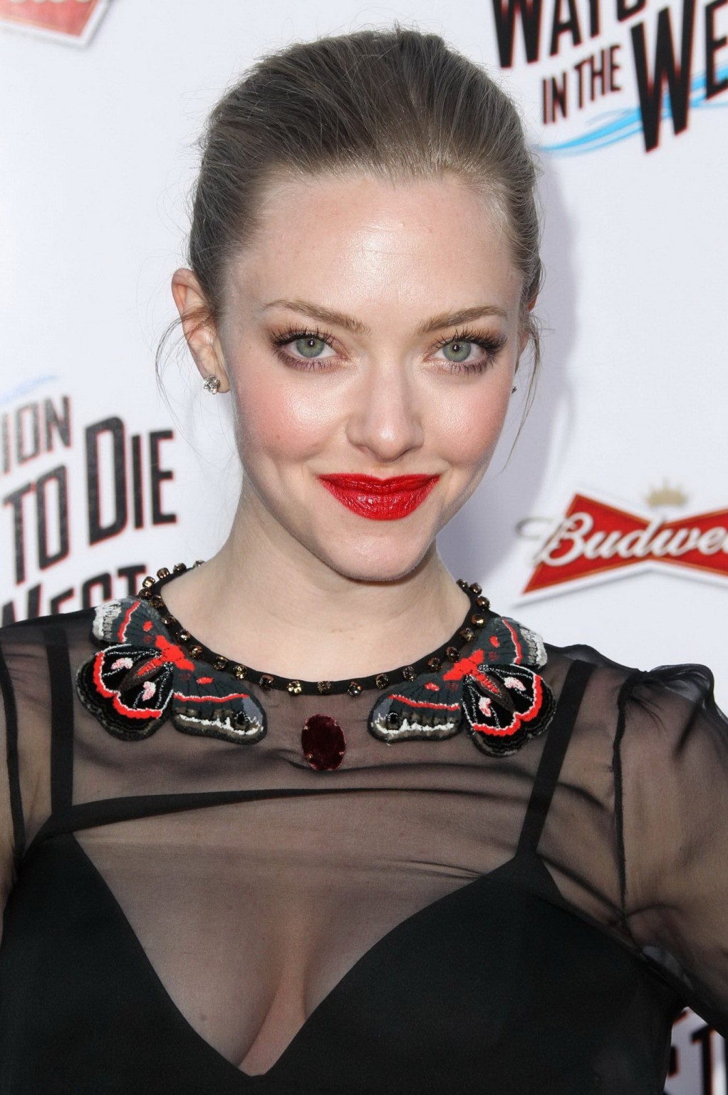 Amanda Seyfried showing huge cleavage in black transparent mini dress at the fil #75196327