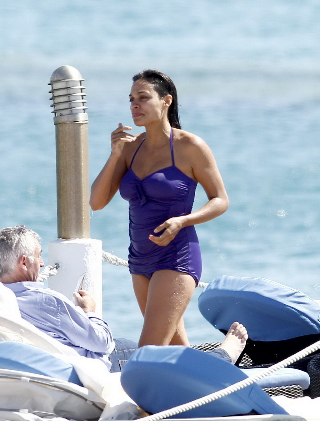 Busty babe rosario dawson have some problems with her purple swimsuit at the bea
 #75196226