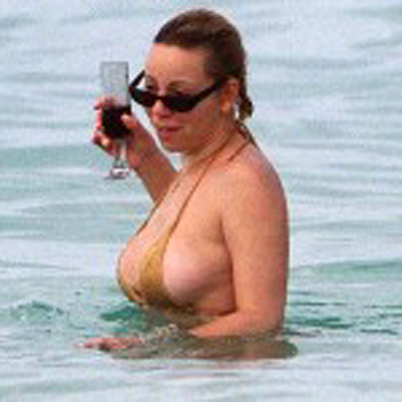 Mariah Carey enjoying on beach and showing sexy body in bikini #75373904