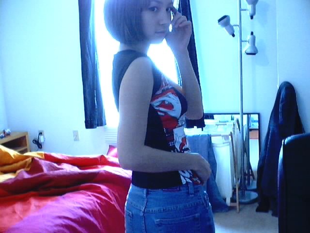 Cute asian girl in front of her webcam #70033199