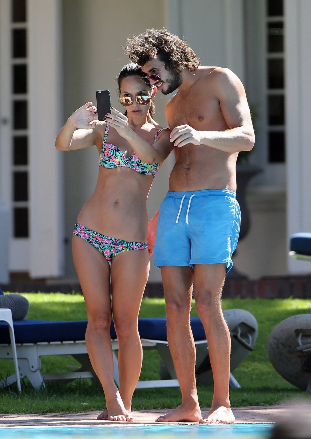 Myleene Klass showing her hot body in a skimpy floral bikini poolside in South A #75169178