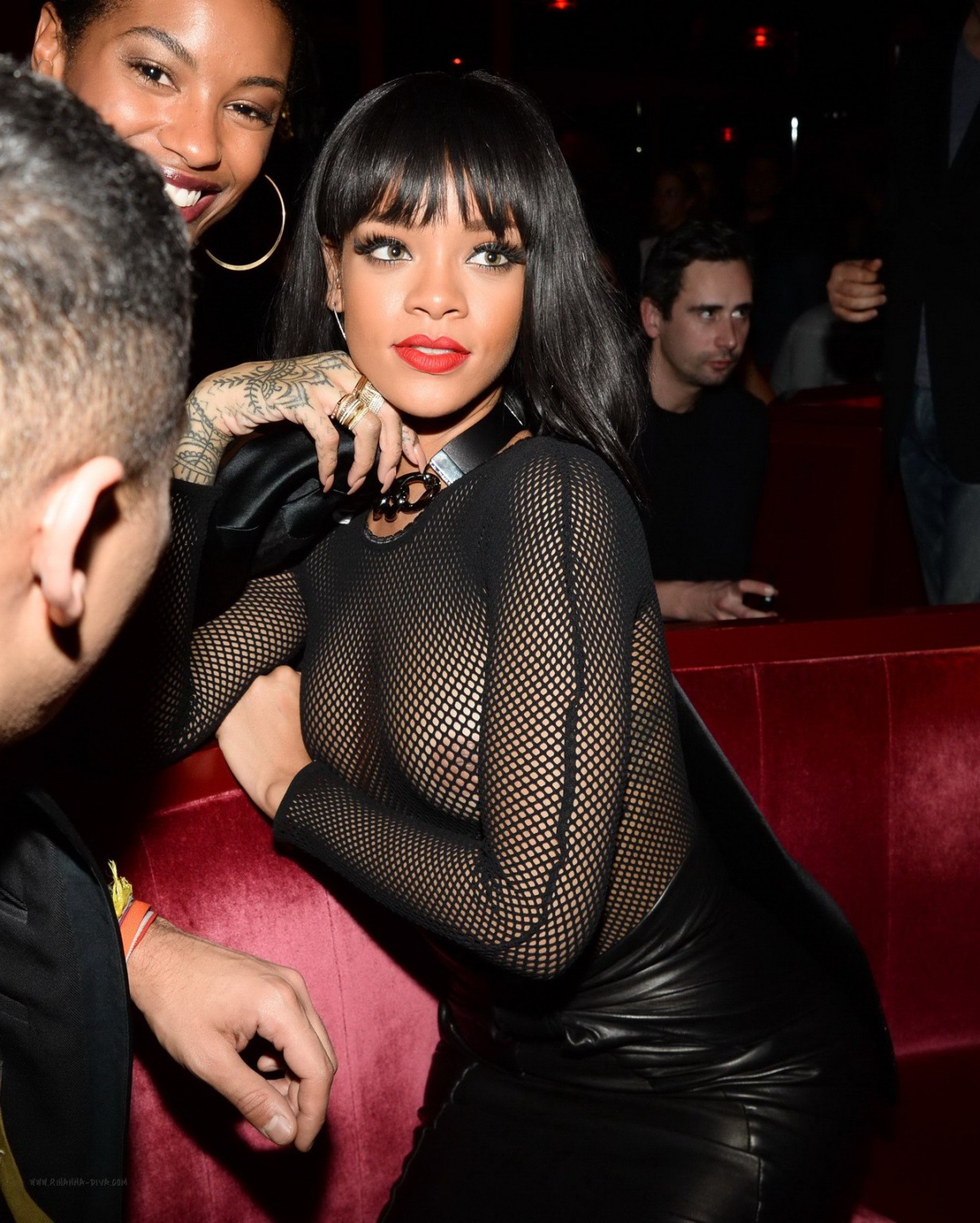 Rihanna braless wearing fishnet bodysuit and leather outfit at the Balmain Fashi #75203484