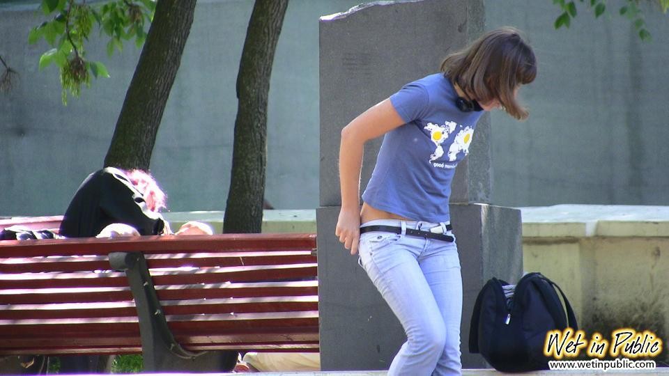 Sexy tight jeans of a street girl get striped after sudden pee fail #73244383