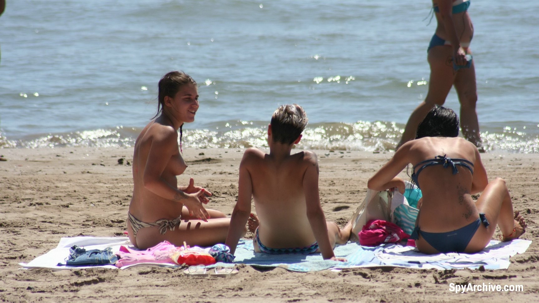 Hot topless blonde gets filmed by beach voyeur #72242344
