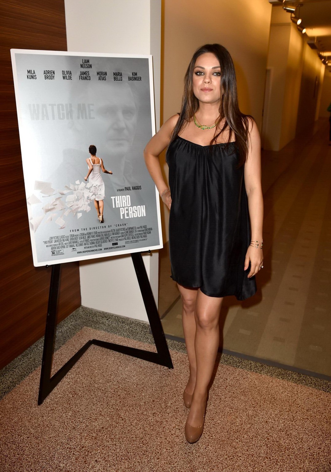 Mila Kunis leggy wearing a little black dress at the Third Person premiere in Ho #75194466