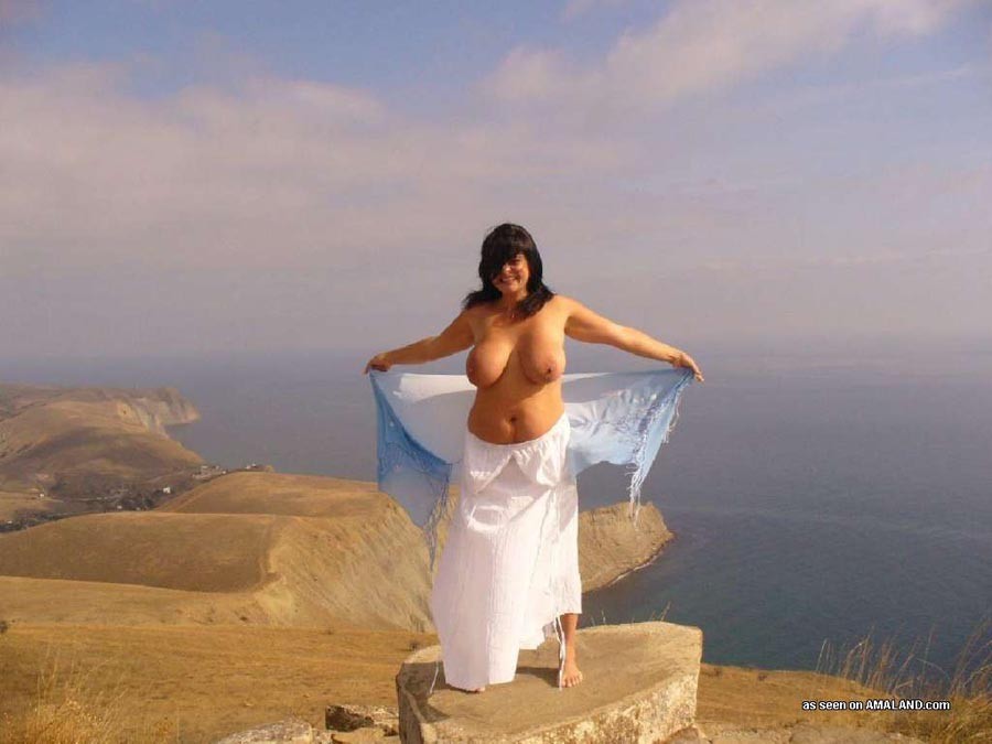 Plump slut totally naked ontop of a cliff  #71851073