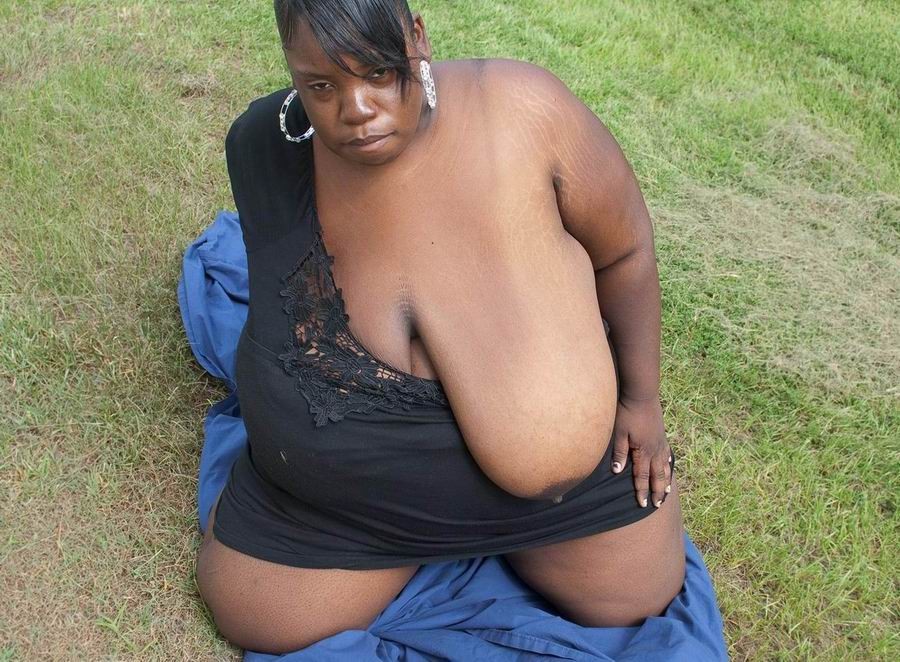 Fat ebony showing her very huge boobs #71756164