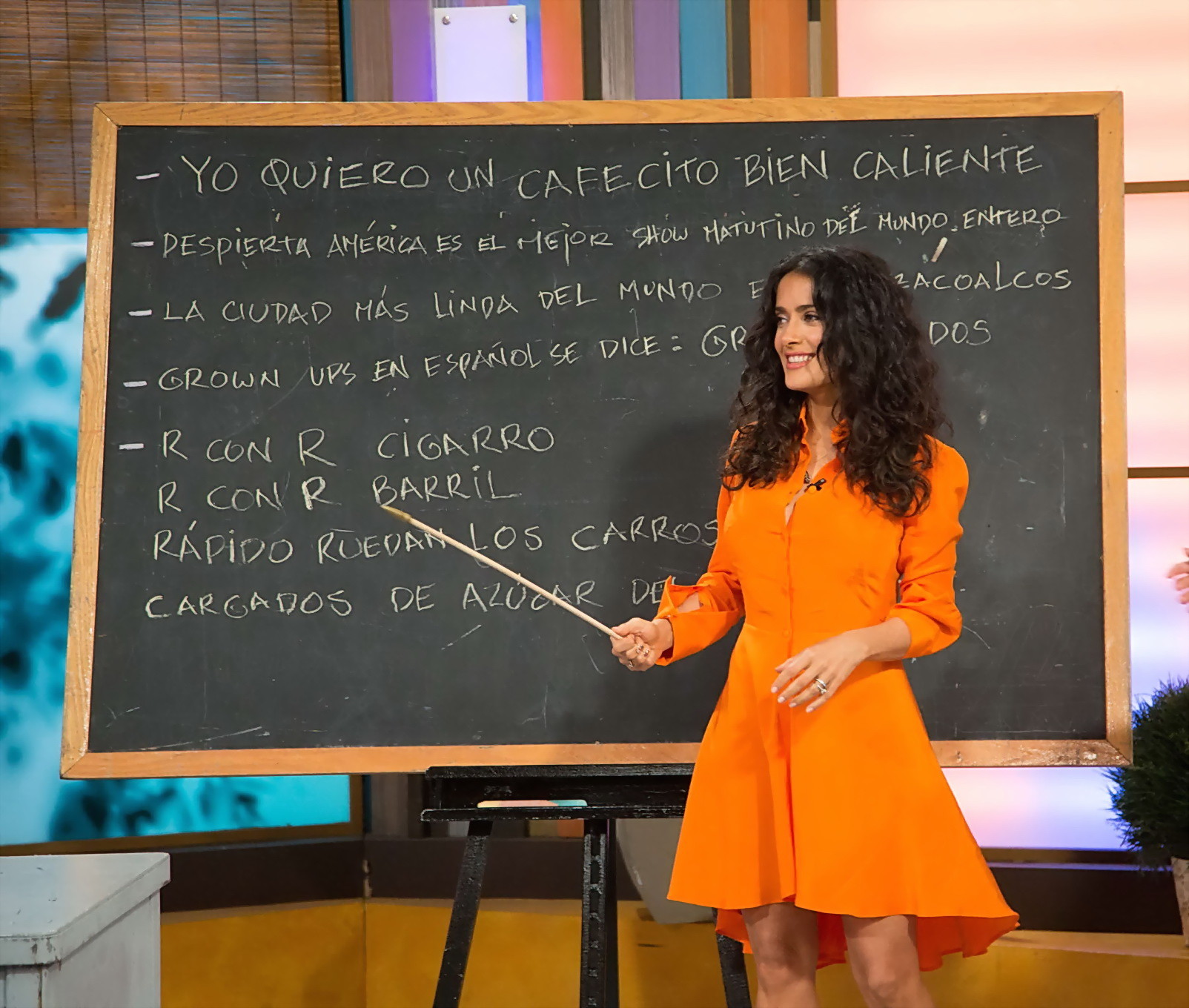 Salma Hayek upskirt wearing short orange dress at Despierta America Show in Miam #75225102