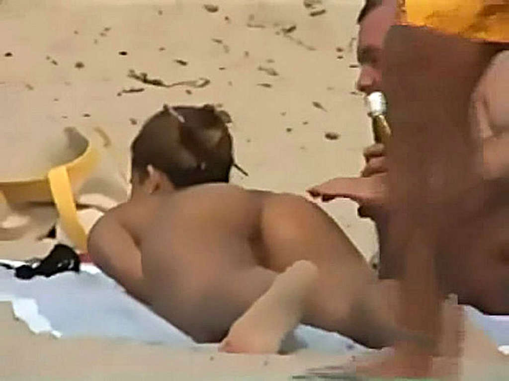 Clara Morgane exposing her nice big tits and pussy on beach #75360480