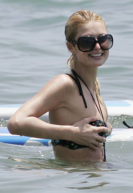 Celeb superstar Paris Hilton shows perky tits in the sea #75427289