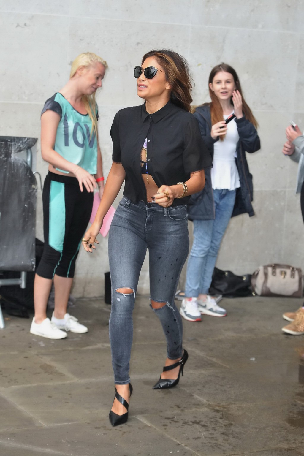 Nicole Scherzinger bra peek while doses a fan with iced water out of BBC Radio S #75187311