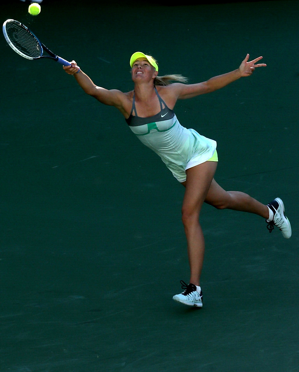 Maria Sharapova flashing her green panties at the 2013 BNP Paribas Open Day 5 in #75238982