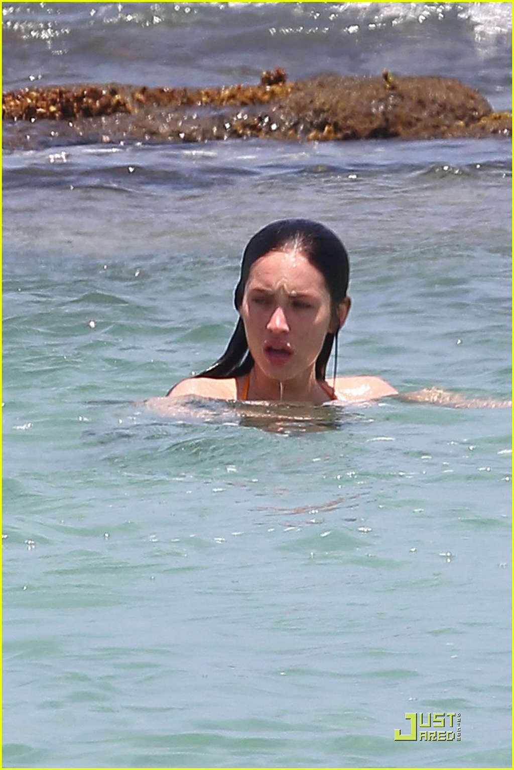 Megan Fox in bikini playing on beach with her boyfriend #75343171