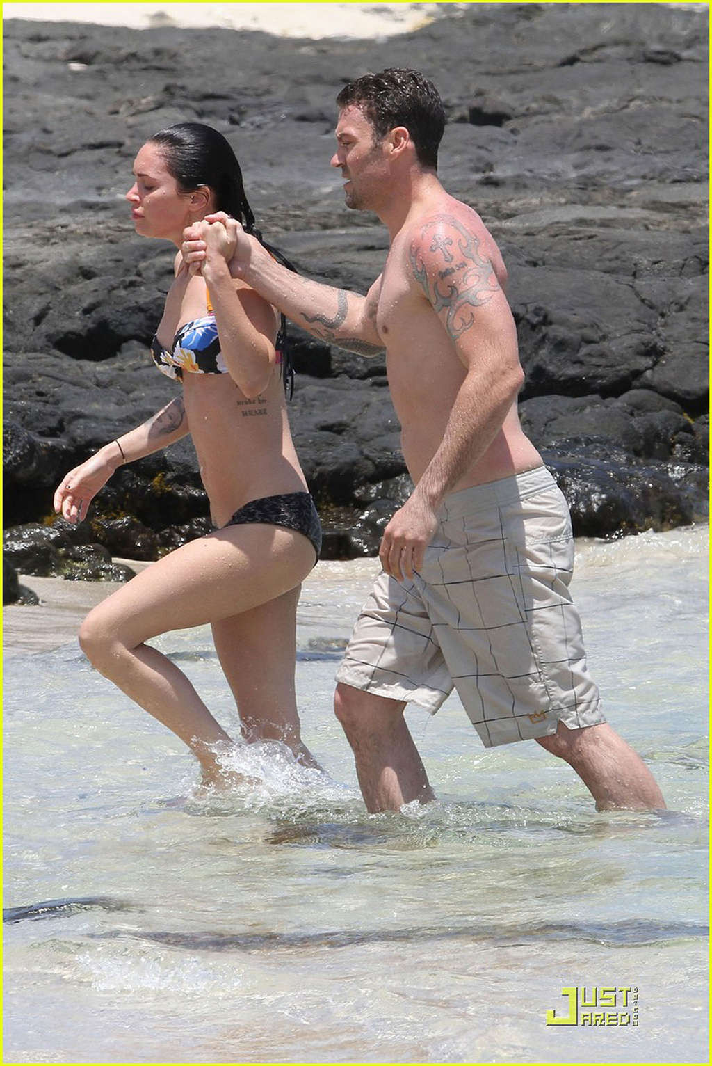 Megan Fox in bikini playing on beach with her boyfriend #75343175