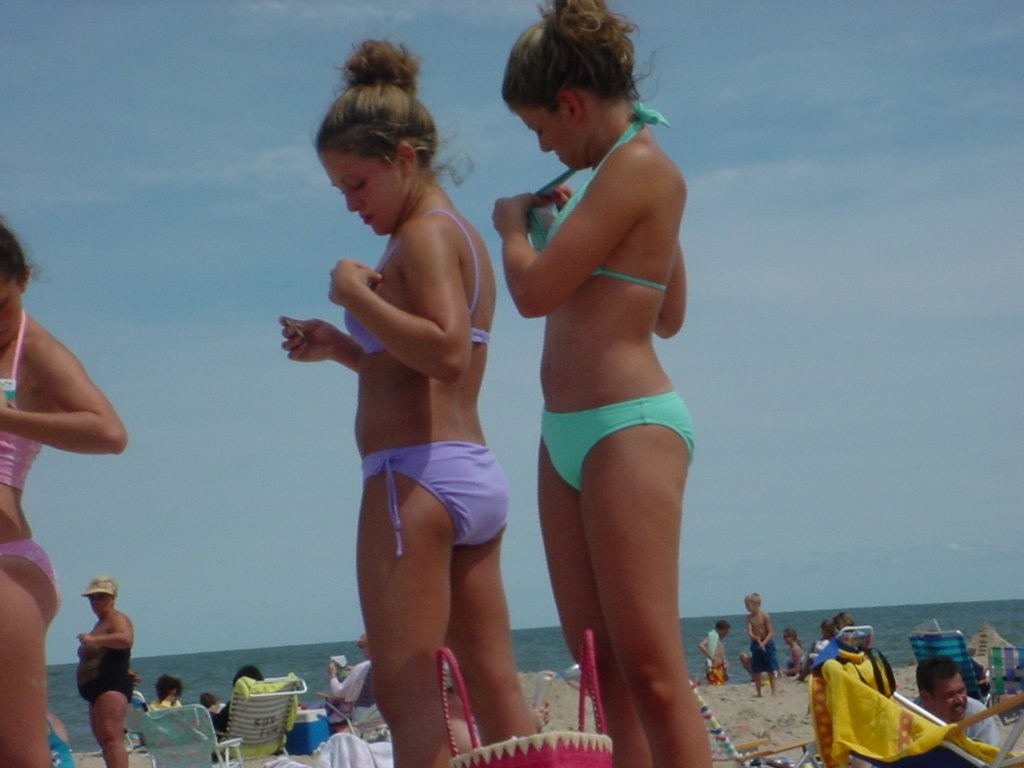Assorted teen amateurs caught going topless in public #78911244