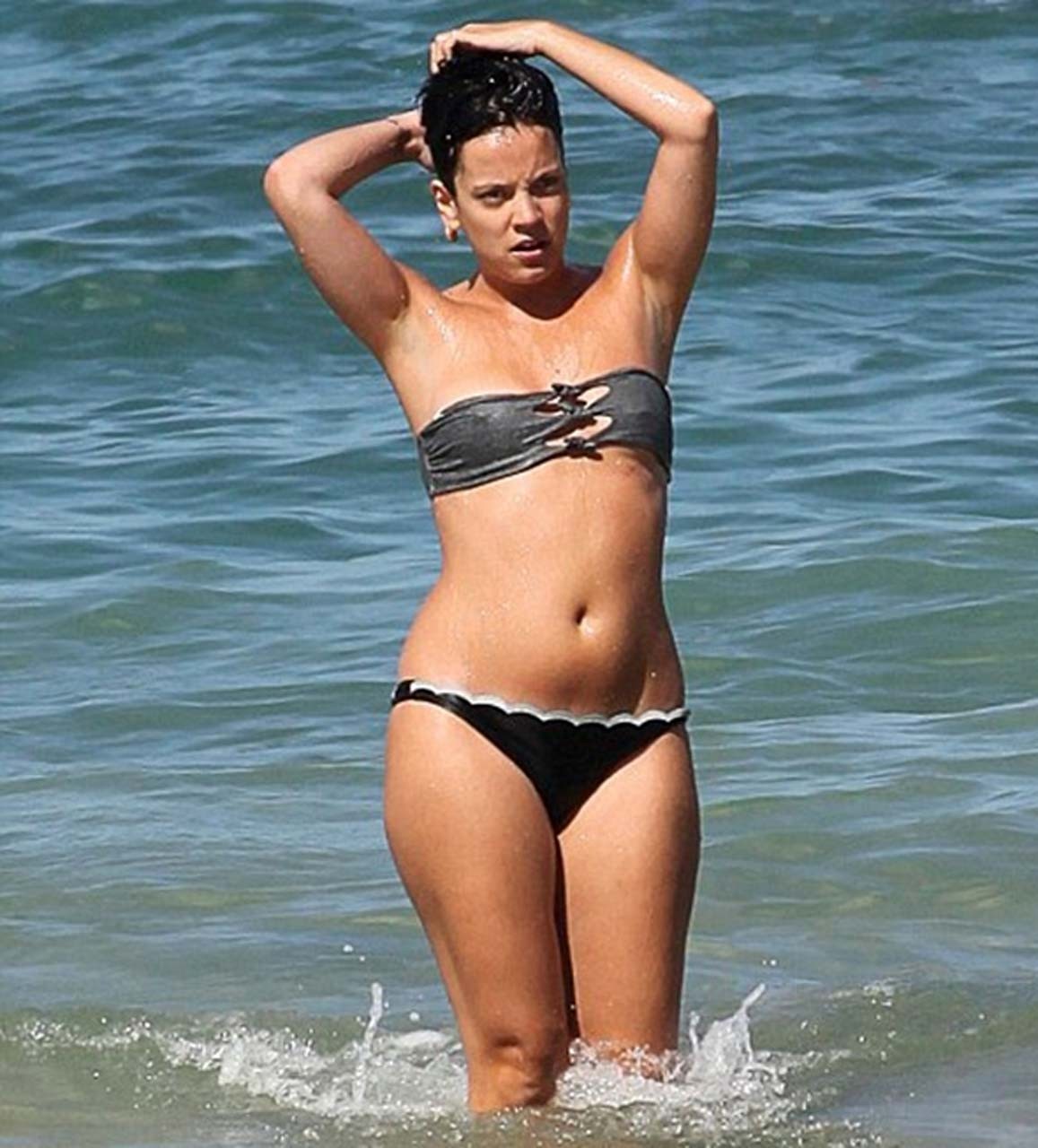Lily Allen very leggy in mini skirt and in fuckme boots and in bikini on beach #75315182