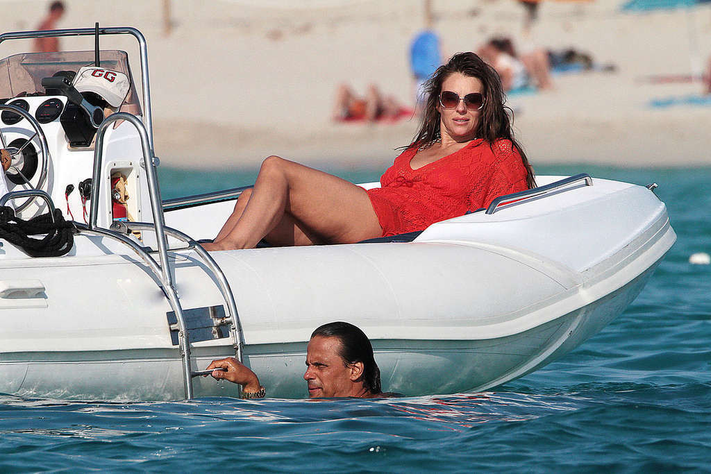 Elizabeth Hurley exposing her sexy body and huge boobs in bikini on yacht #75338153