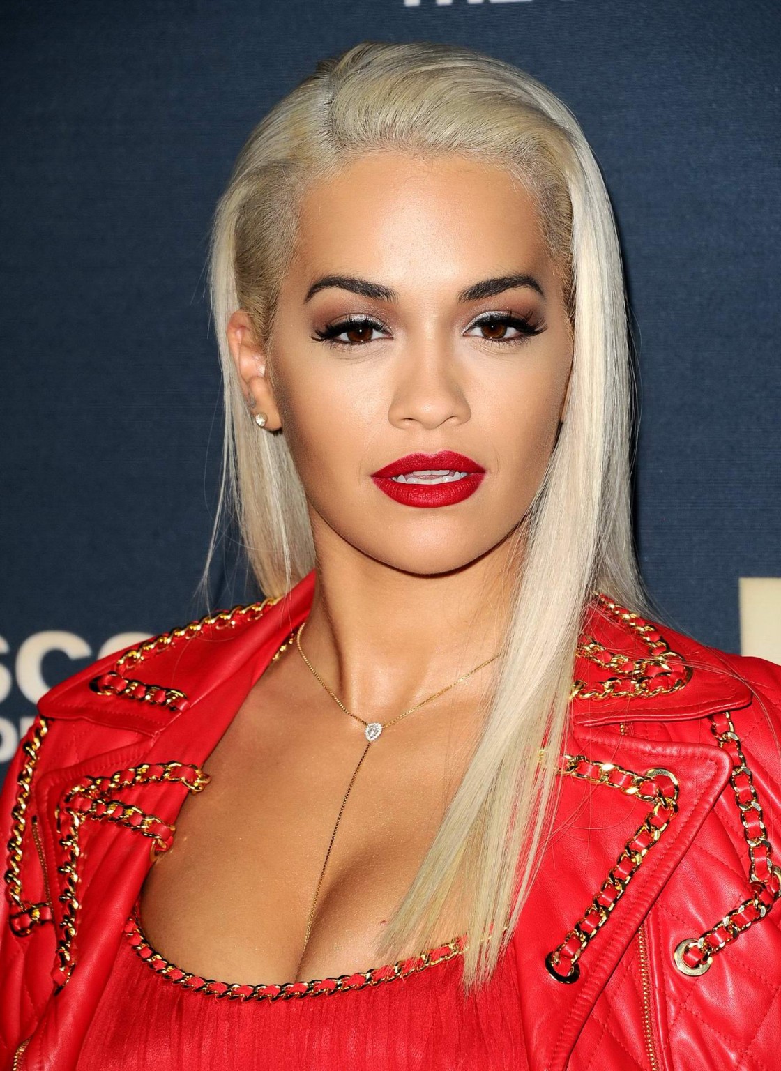 Rita Ora leggy  cleavy wearing red low cut top  shorts #75152753