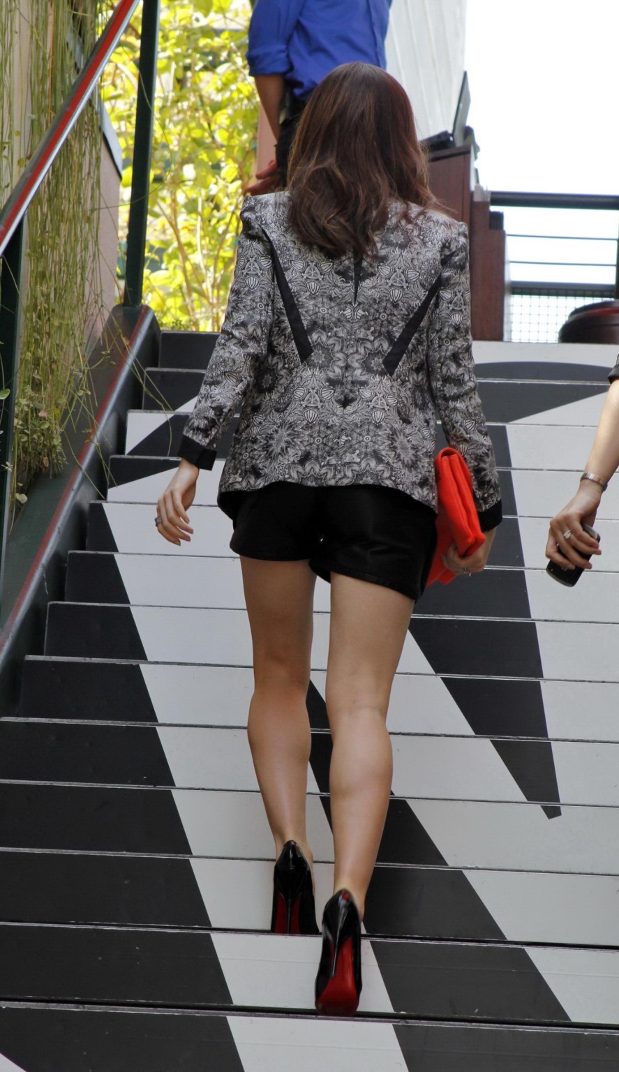 Lily Collins leggy wearing a leather shorts on the set of Extra in LA #75237000