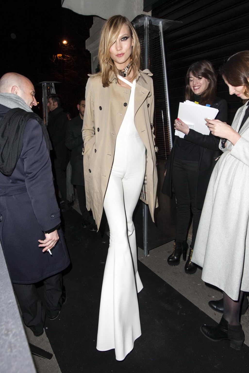 Karlie Kloss areola peek wearing a partially see through jumpsuit at the Versace #75172685