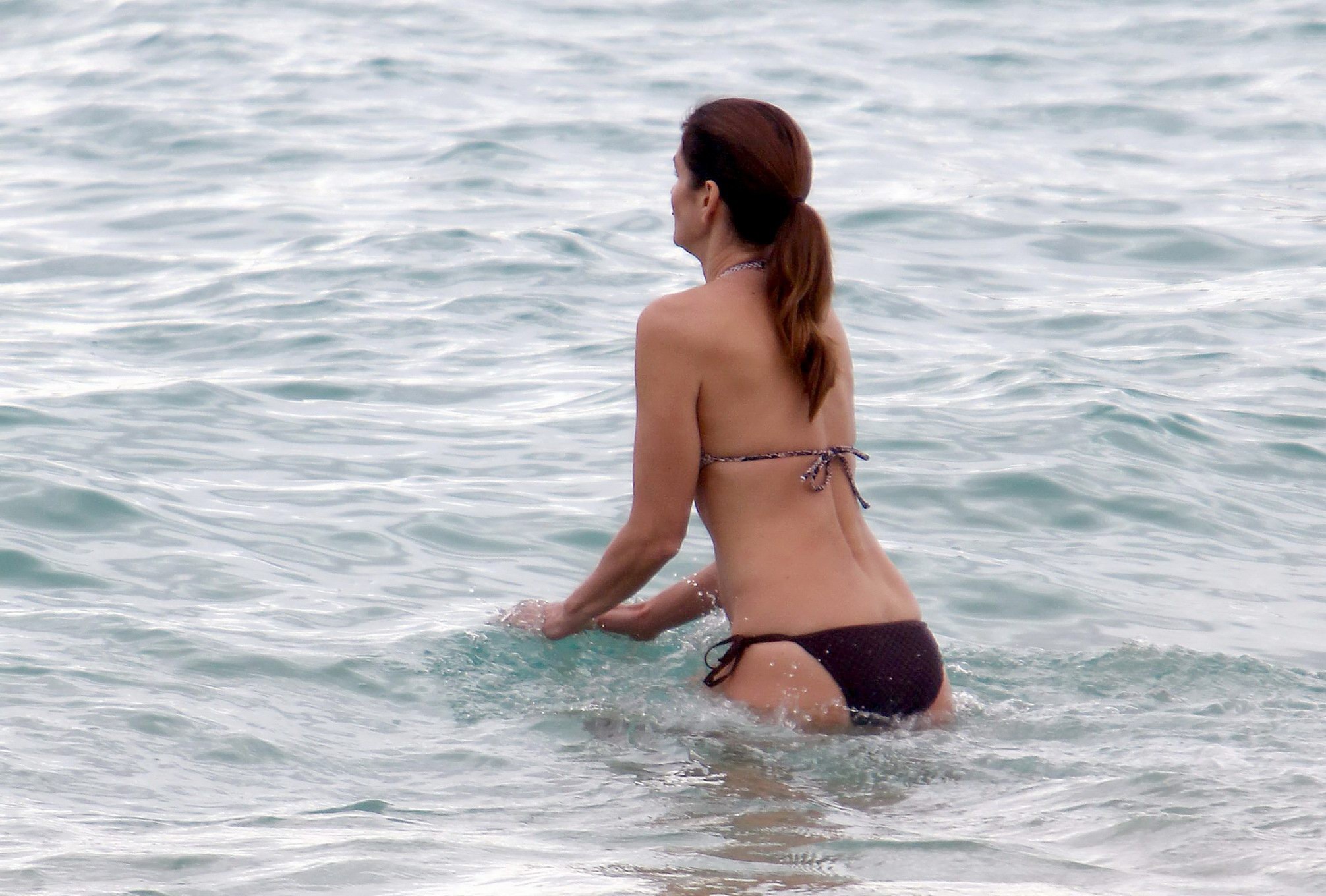 Cindy crawford portant un bikini imprimé serpent à Cabo san lucas
 #75281185