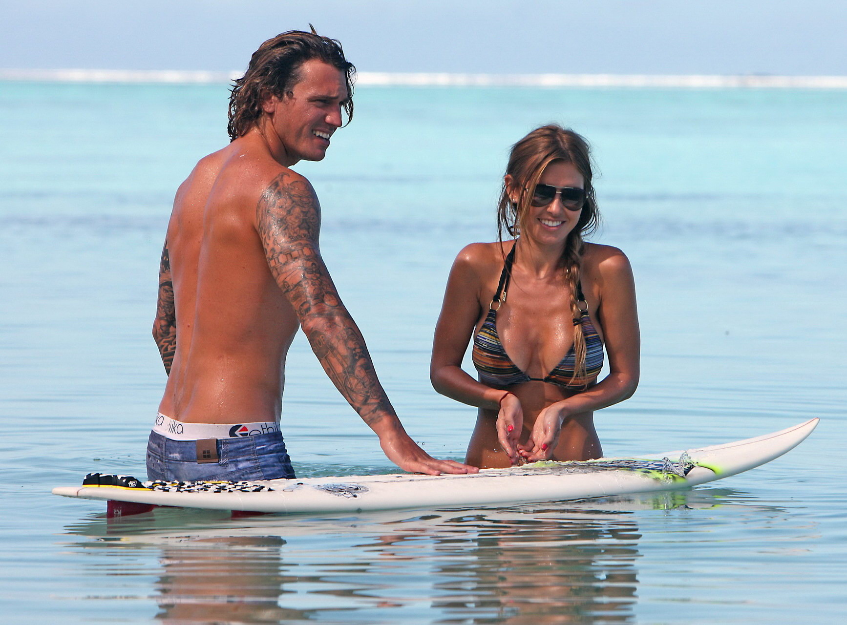 Busty Audrina Patridge wearing skimpy bikini on a surfboard #75337420