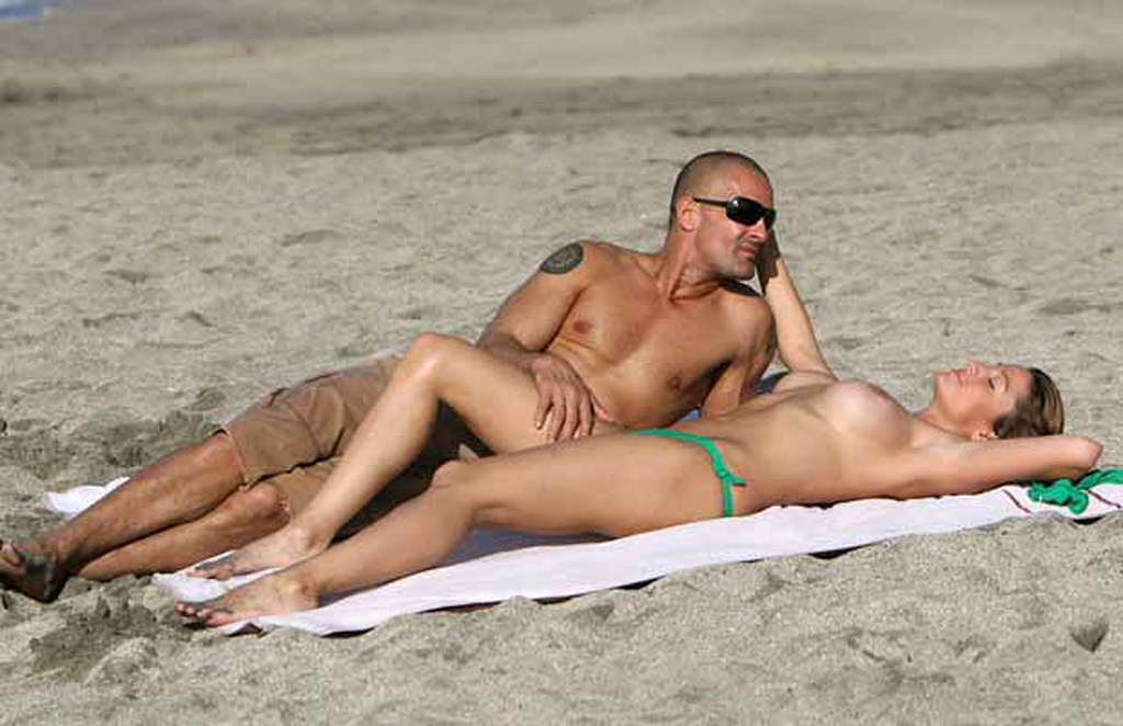 Rebecca Loos exposing her nice big tits on beach paparazzi shoots #75350382