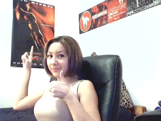 Cute asian teen posing in front of her webcam #70033188