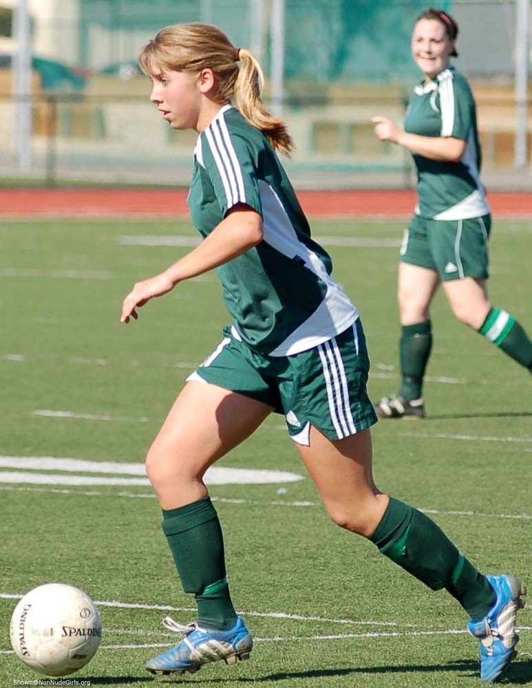 Teen girls playing soccer #78627135