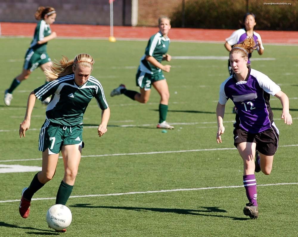 Teen girls playing soccer #78627141