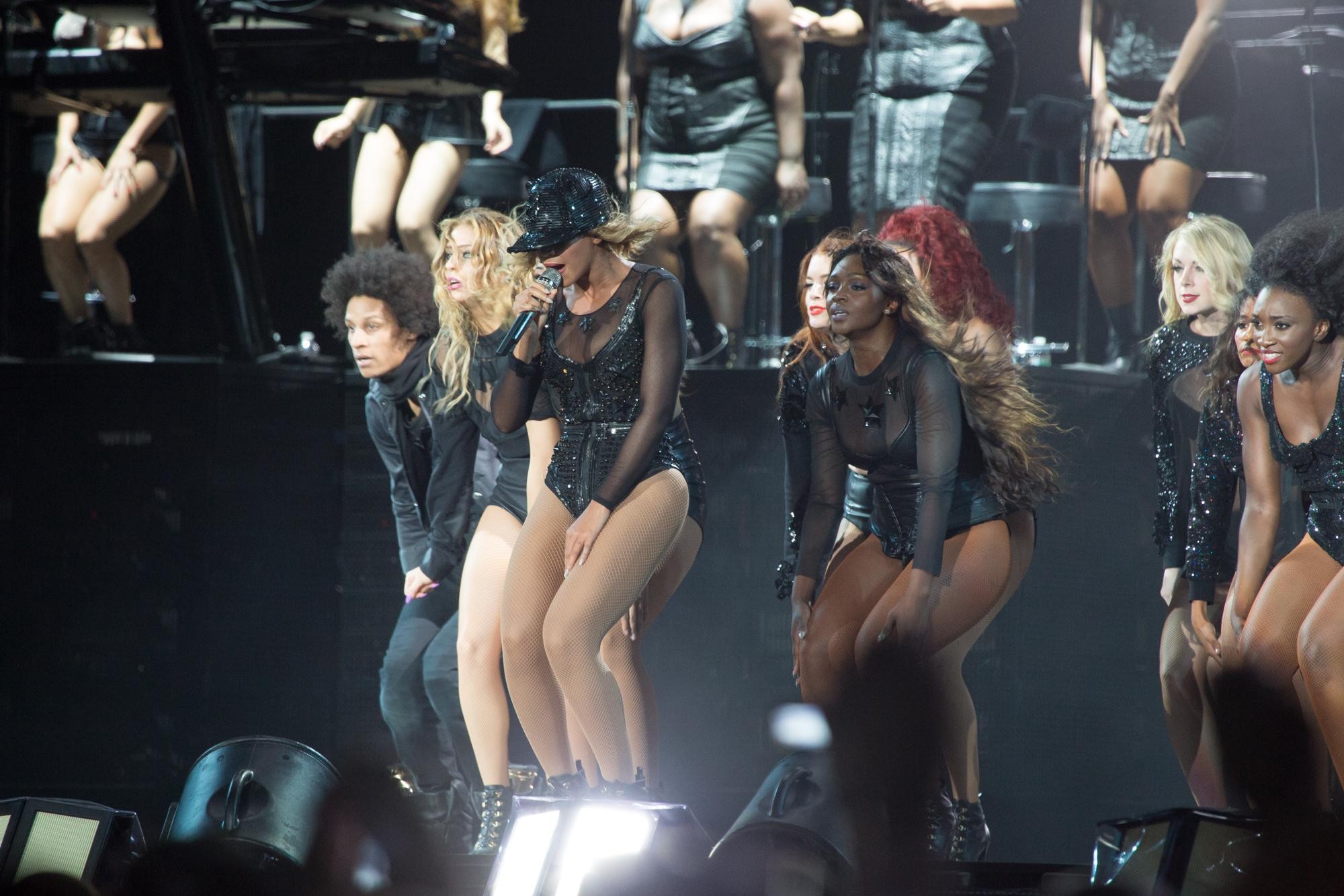 Beyonce Knowles wearing fishnets  various sexy bodysuits on stage at the Budweis #75219992