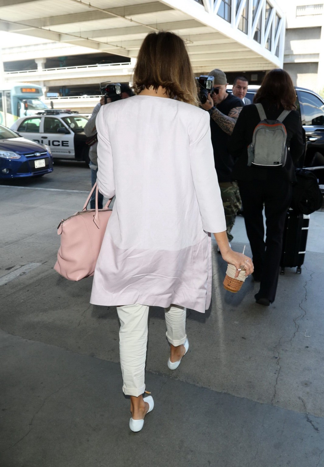 Jessica Alba cleavy wearing a low cut top at LAX Airport #75165003