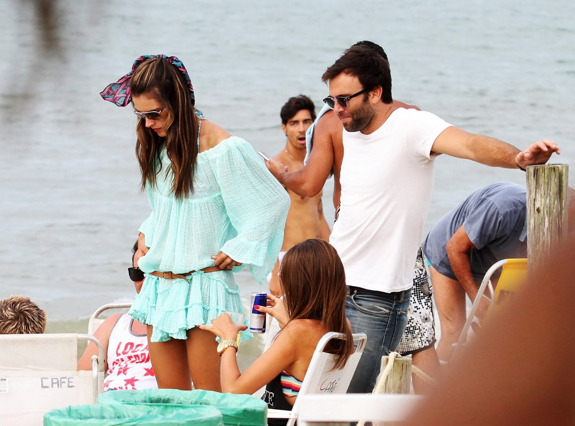 Alessandra Ambrosio in bikini buying a summer dress on a beach in Brazil #75244422