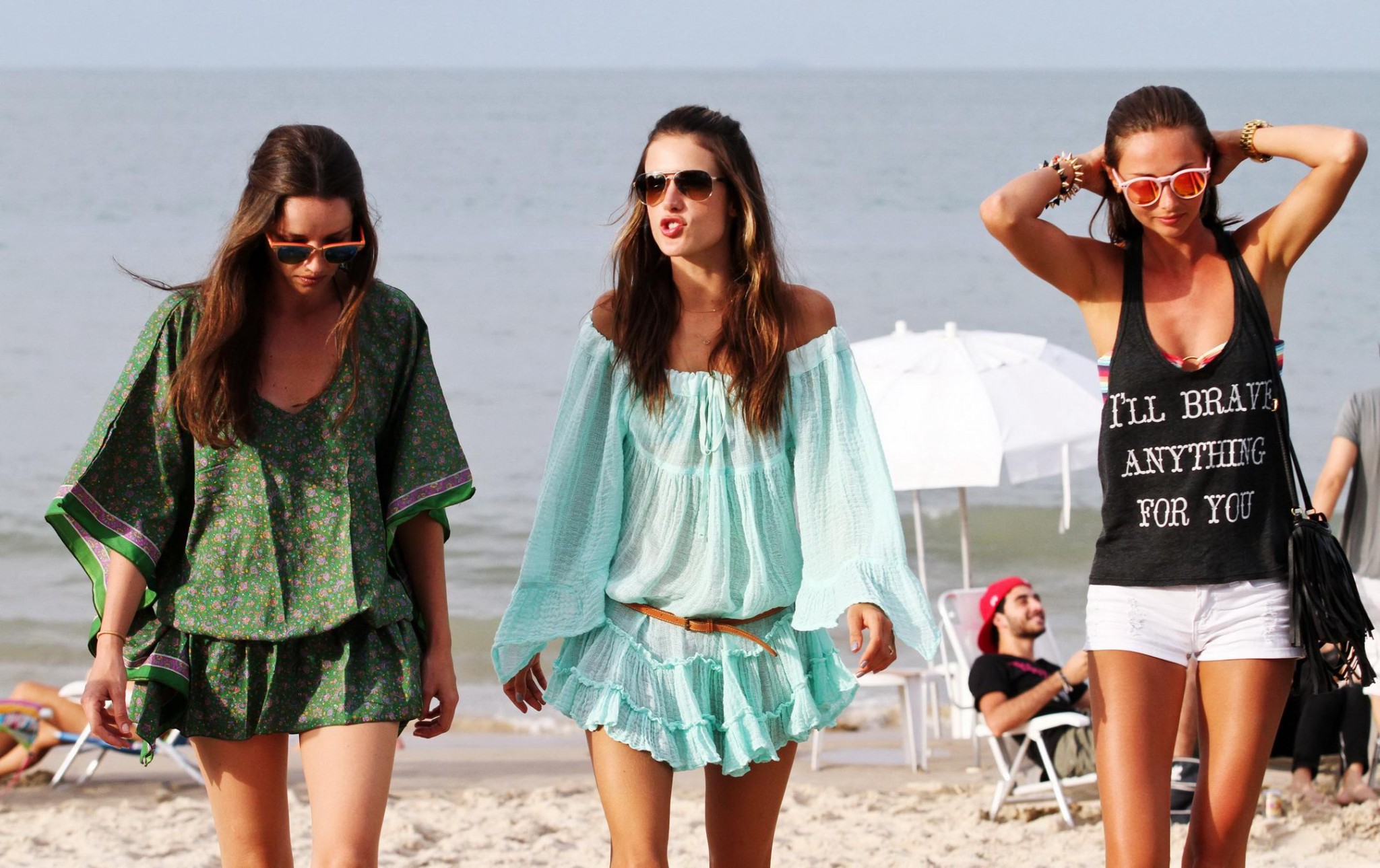 Alessandra Ambrosio in bikini buying a summer dress on a beach in Brazil #75244429