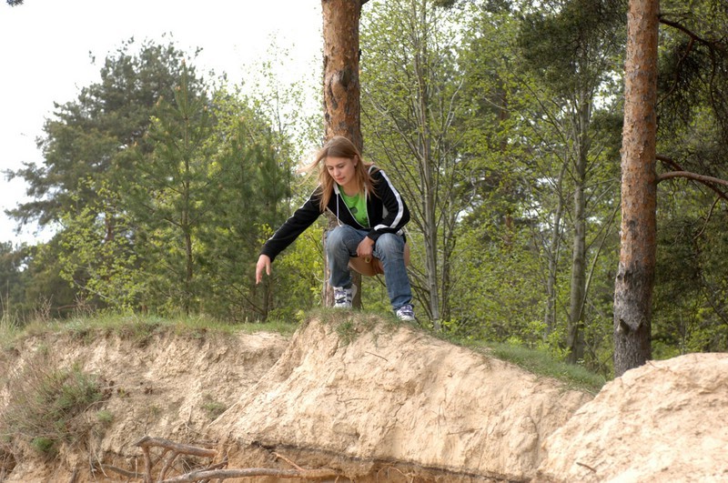 Girl takes off her pants and takes a piss outdoors #76577084