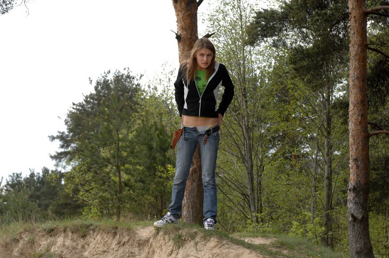 Girl takes off her pants and takes a piss outdoors #76577194