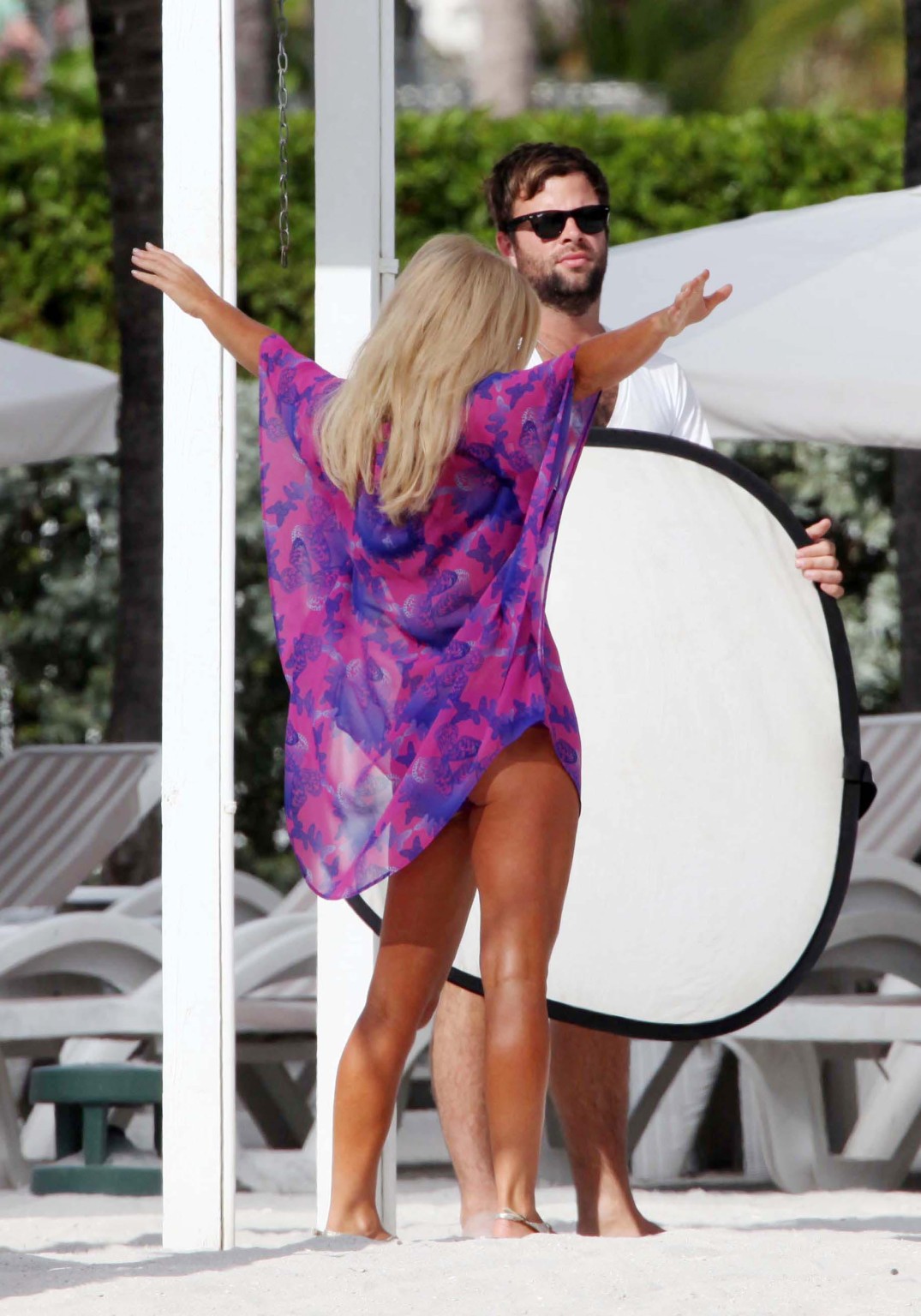 Geri Halliwell busty wearing navy strip bikini out on her hotel balcony in Miami #75325514