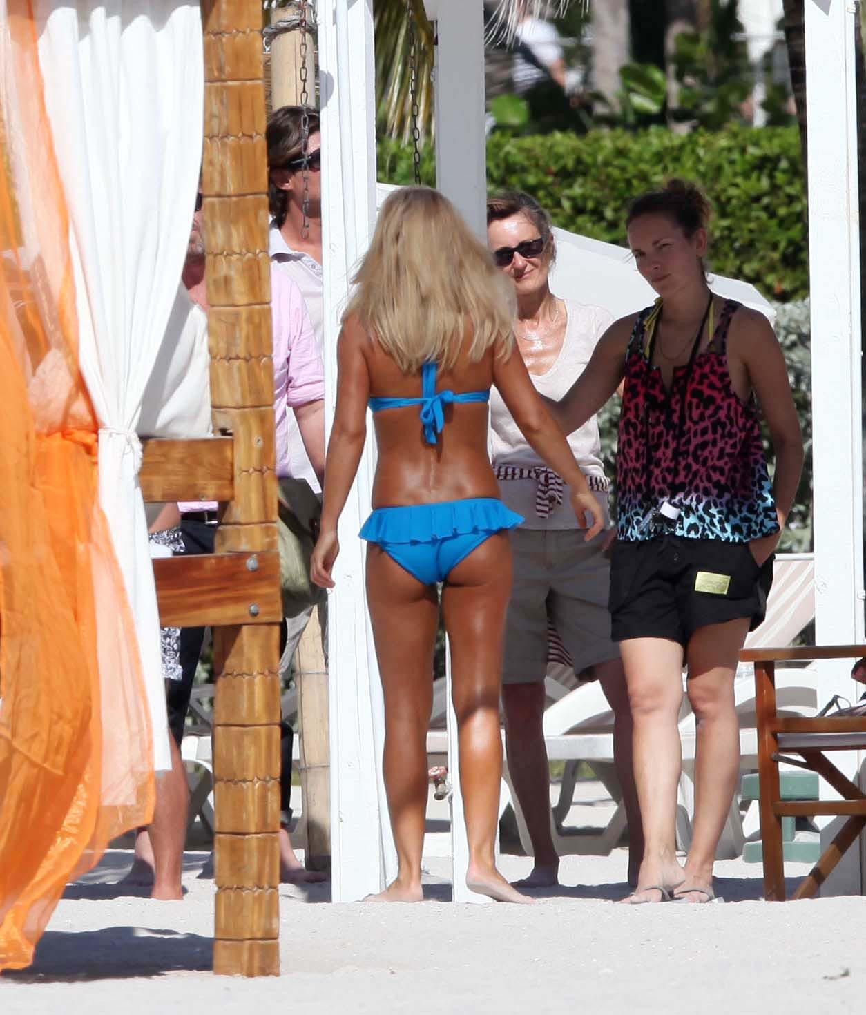 Geri Halliwell busty wearing navy strip bikini out on her hotel balcony in Miami #75325540