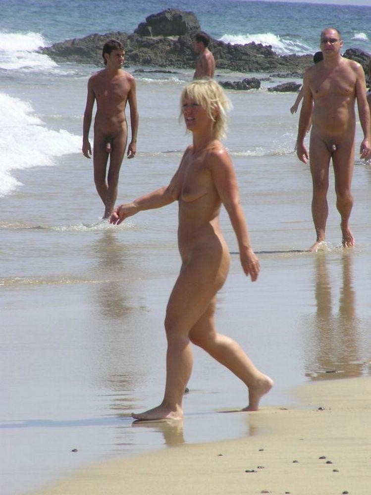 Barely legal nudist babe lights up at the beach #72257665