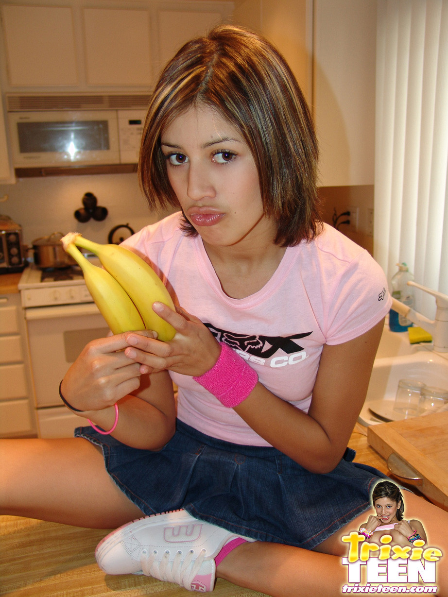 Erotic teen sucking on a big banana #74940392