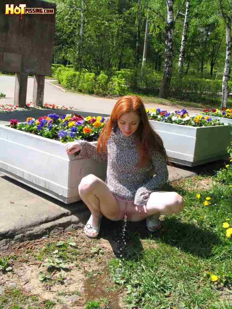 Redhead pissing outdoors #76569634