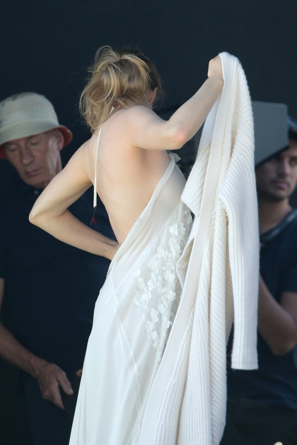 Amanda Seyfried showing boobs in white transparent nightie while filming video i