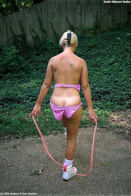 Tiny teen jumping rope loses her bikini top
 #73199984